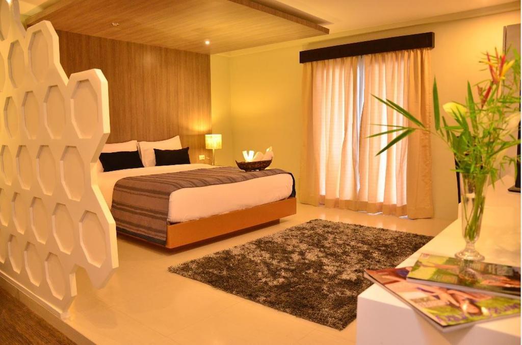 วัน มานาโล เพลส Hotel Puerto Princesa ภายนอก รูปภาพ
